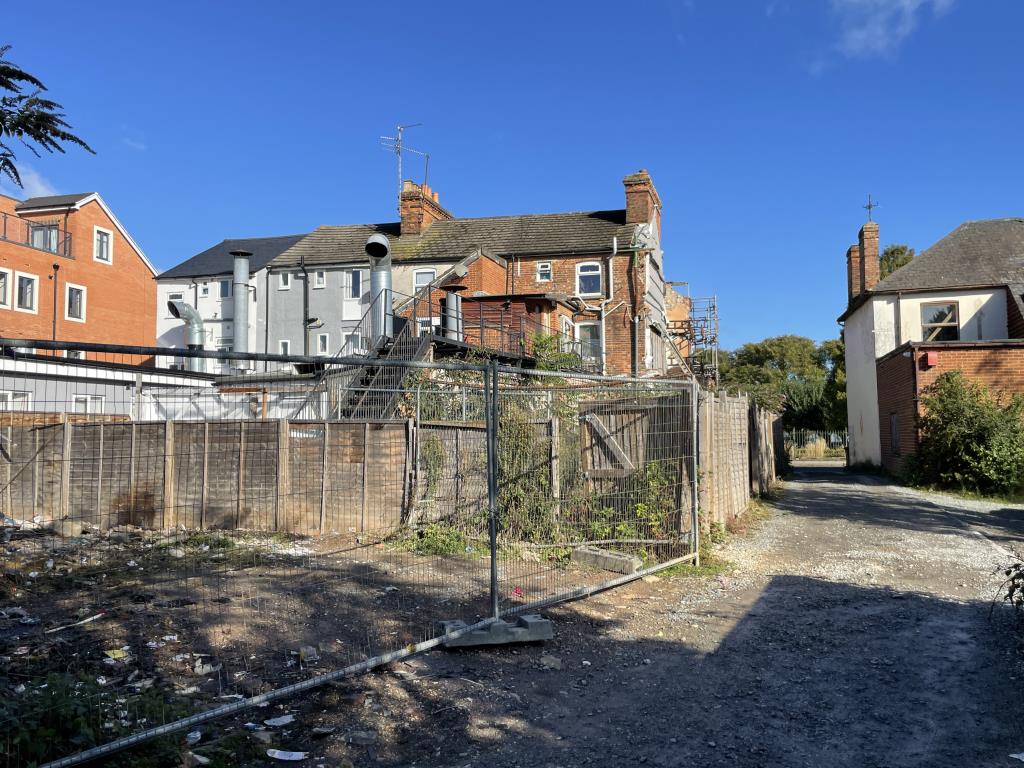 Lot: 77 - TOWN CENTRE SITE WITH POTENTIAL FOR DEVELOPMENT -